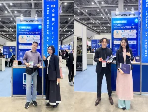 Newwave 팀이 방문객들과 소통하며 솔루션을 소개하는 모습 